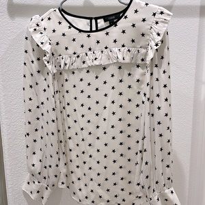 Ruffle detail star print blouse